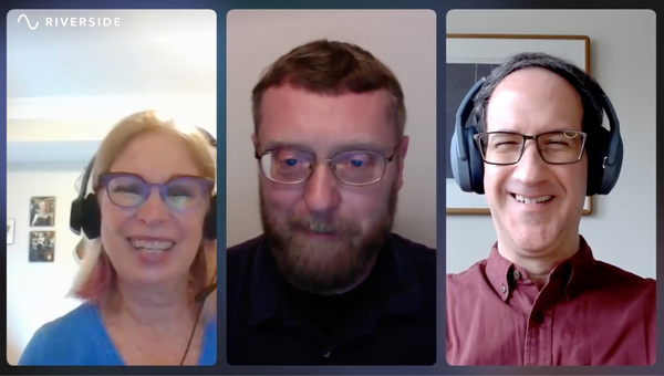 three people—a woman, a man, and another man—on a video call